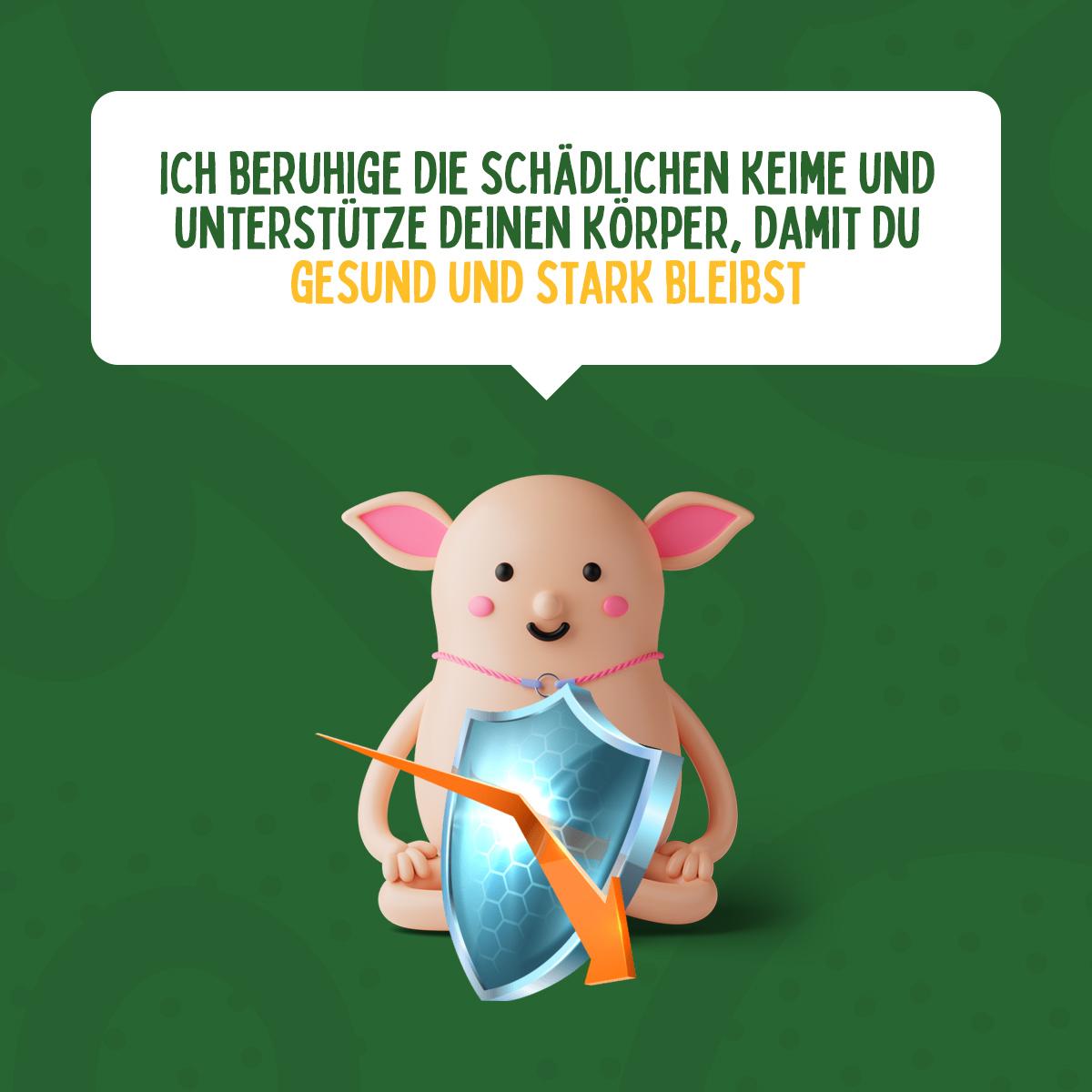 Yogu sitzt mit gekreuzten Beinen und einem Schild vor sich und sagt: Ich beruhige die schädlichen Keime und helfe dir, deinen Körper zu schützen, damit du gesund und stark bleibst.